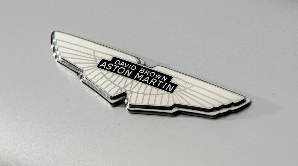 Evolution of the Aston Martin Emblem: From Art Deco to Modern Minimalism